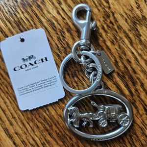 Coach. Horse and carriage bag charm. Silver. Pre loved. VGU condition.